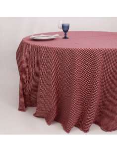Mesa redonda con mantel vichy rojo